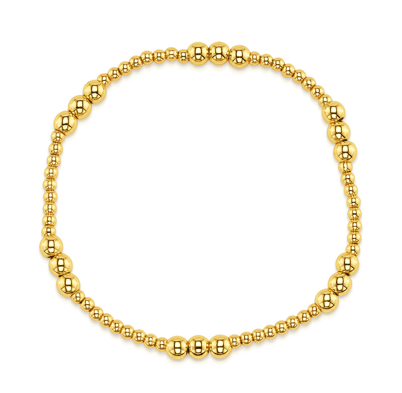 TRIPLE STATION STRETCH BRACELET, GOLD