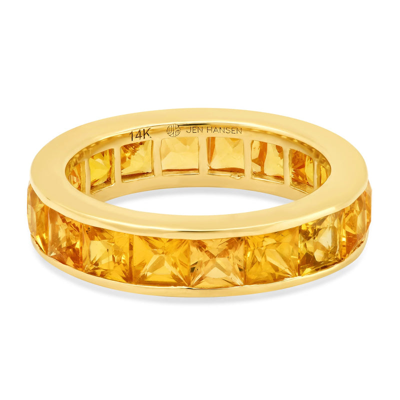 LARGE YELLOW SAPPHIRE CHANNEL SET RING, GOLD